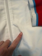 Puma White Jacket with Light Blue Panels and Red Trim
